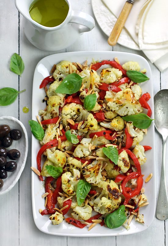 Roasted cauliflower and red pepper salad with toasted almonds and basil