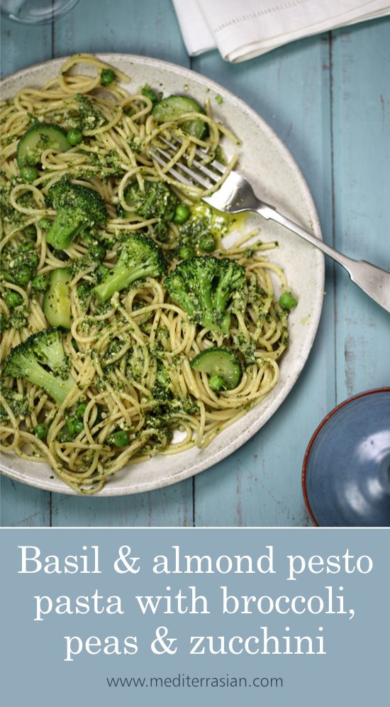 Basil and almond pesto pasta with broccoli, peas and zucchini