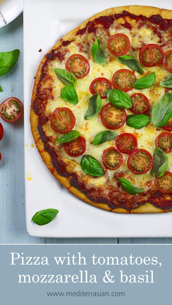 Pizza with tomatoes, mozzarella and basil Pizza with tomatoes, mozzarella and basil